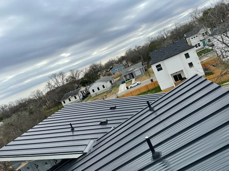 Standing seam metal roof panels with vents for Skylight Repair in Janesville